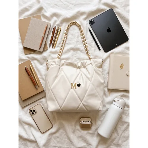 Bolsa Theia 22 Maxi personalizada con letras metálicas
